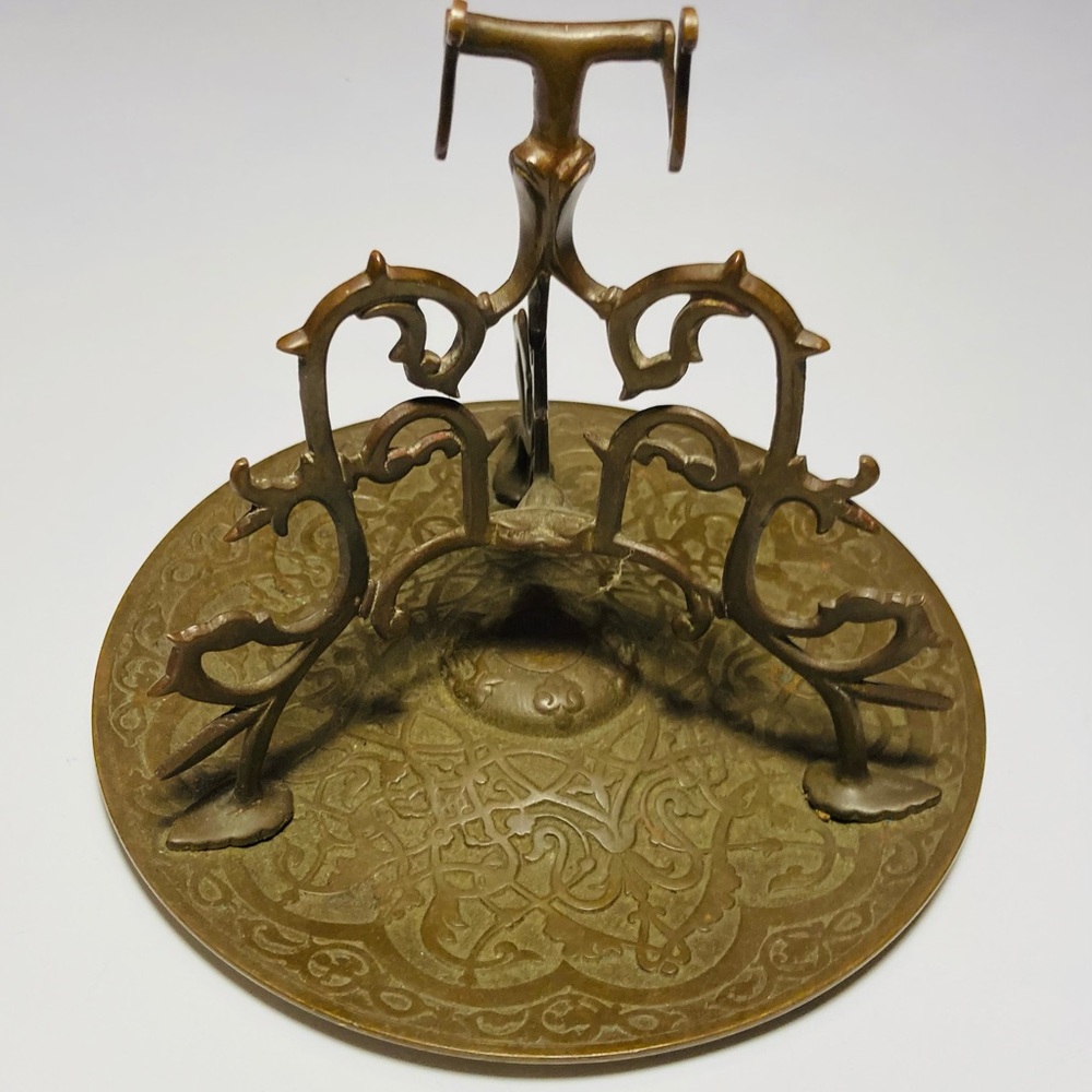 Antique Bronze desk pen holder/ rest probably Persian Islamic symbols on base